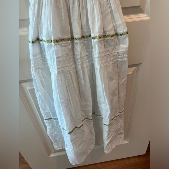 THE GREAT. The Clover Smocking Sleeveless Embroidered Floral Mid Dress - Picture 4 of 16